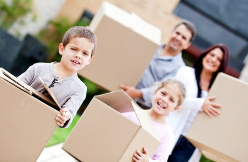 Careful movers loading household items for local removals in Uptonpark