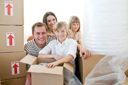 Final stage of house removals in Uptonpark with boxes arranged in a new home