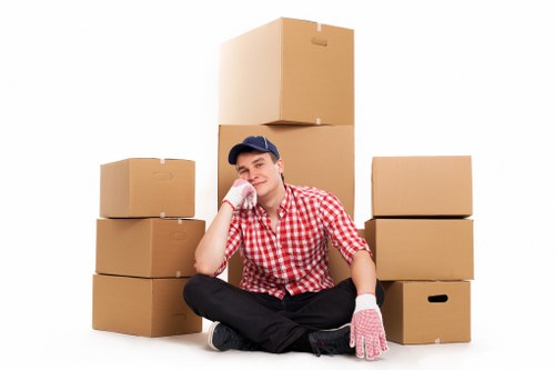 Portable storage container being packed with household items